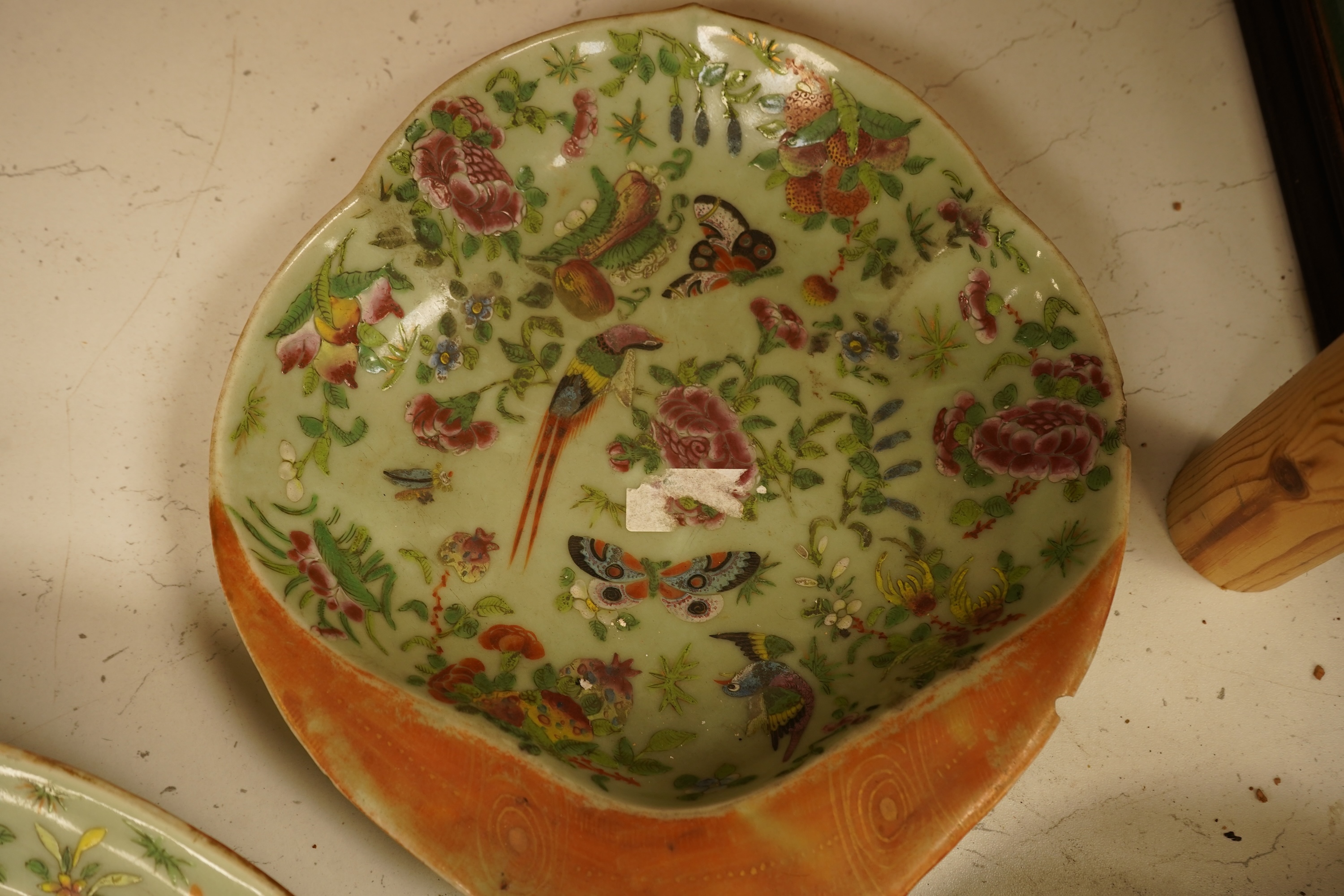 A Chinese celadon ground famille rose dish and two similar dessert dishes, c.1830, meat dish 42cm wide